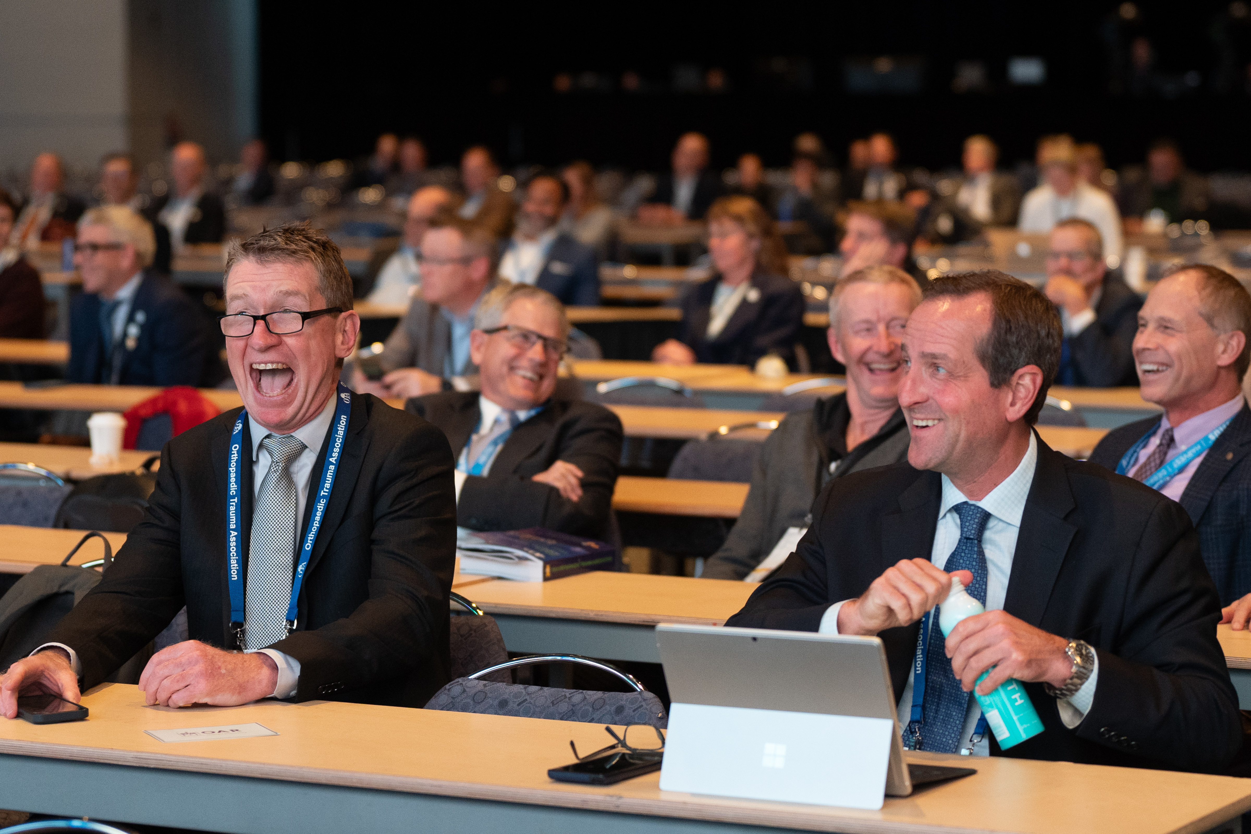 A joyful photo of various OTA members at the 2024 OTA Annual Meeting.